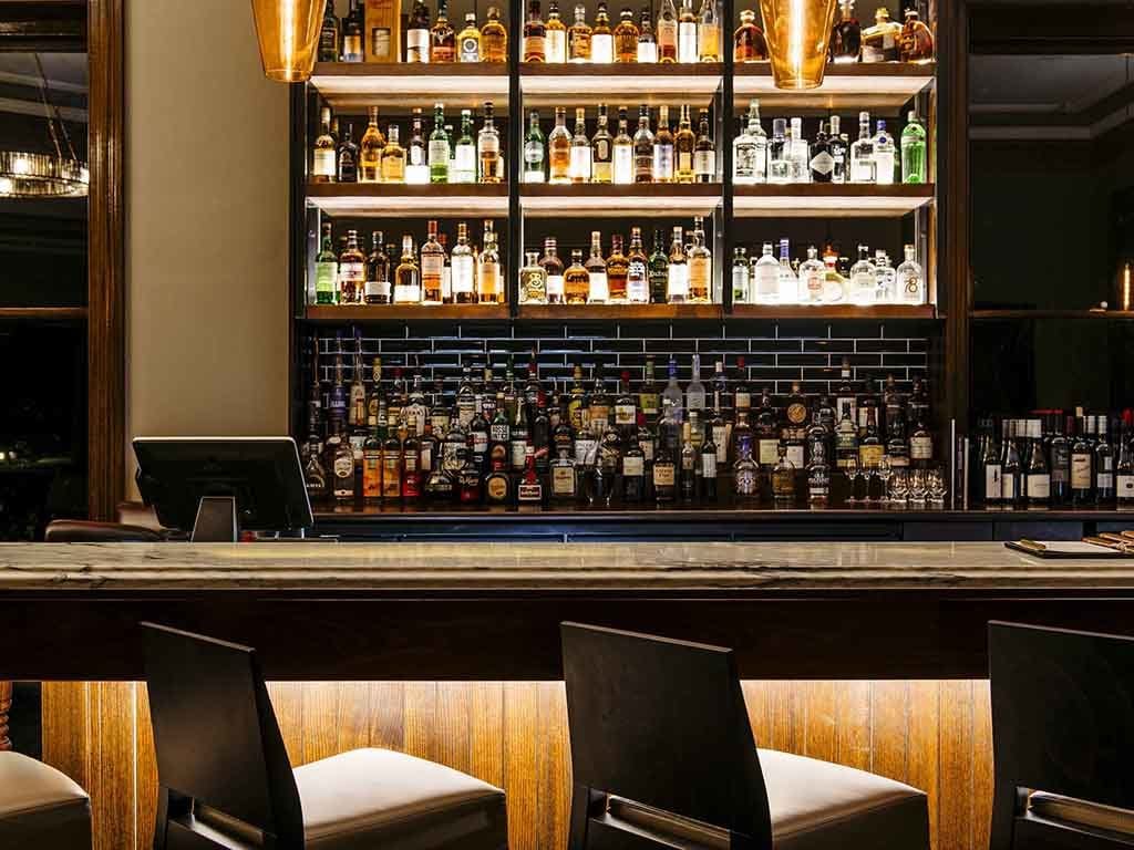 Bar with shelves of alcohol