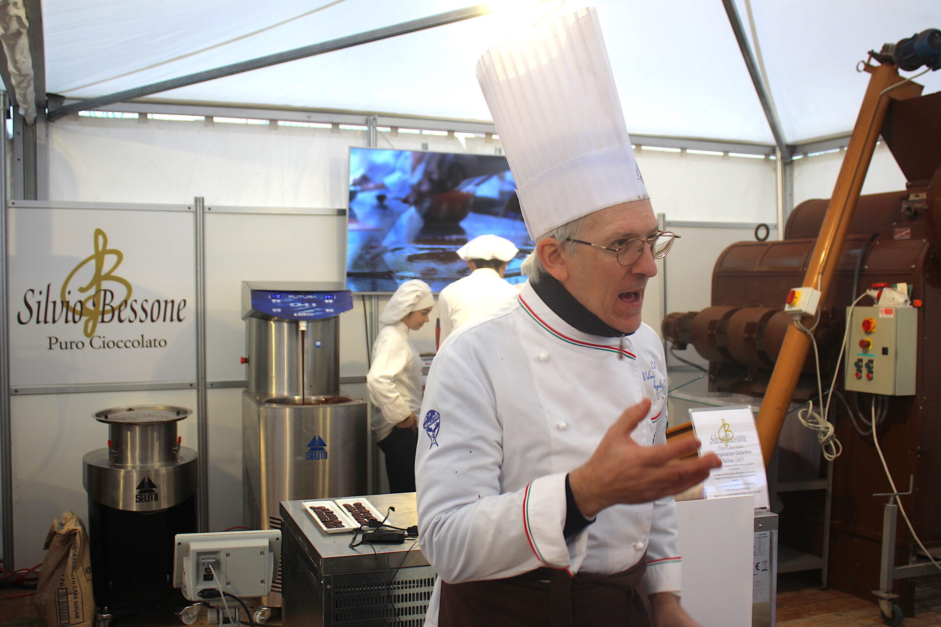 Male chef demonstrating the chocolate making process in Piedmont