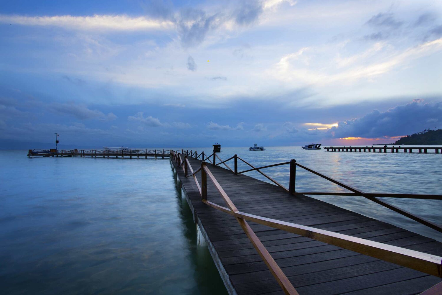 dock reaching out into the ocean indonesia
