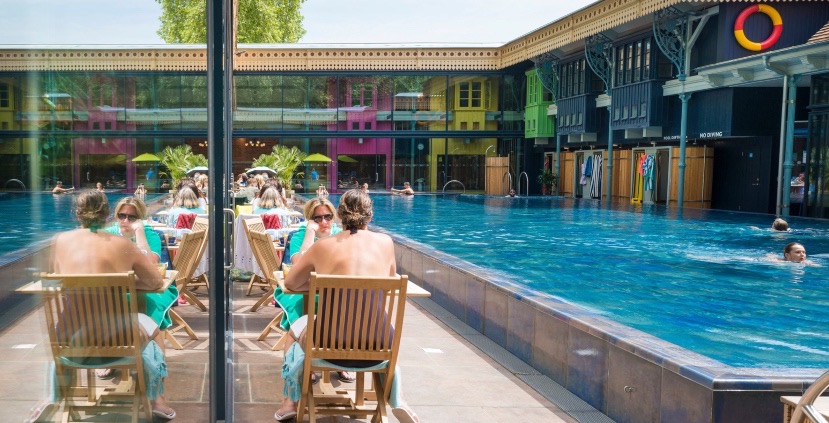 Thames Lido's luxury swimming pool and outdoor seating.