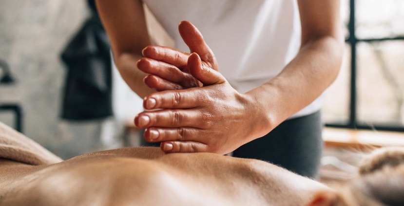 Picture of woman receiving a back massage.