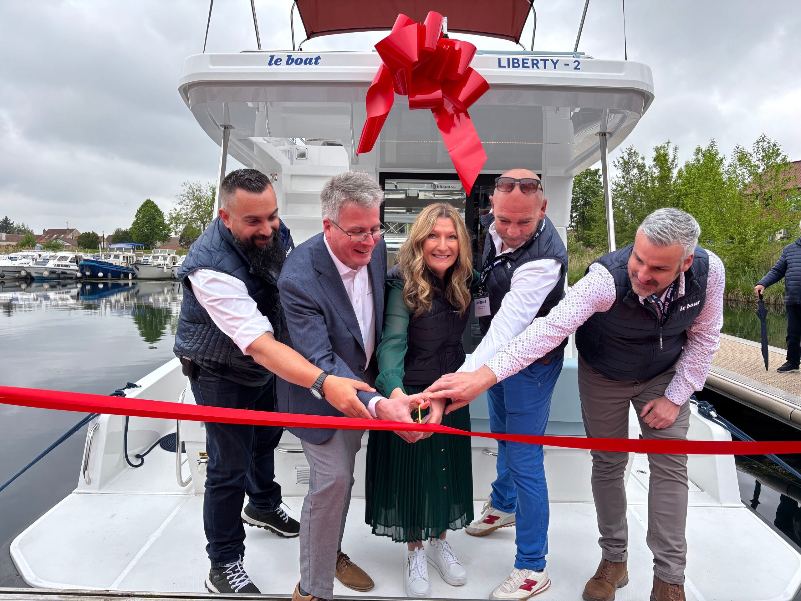 Le Boat Managing Director Cheryl Brown launch the Liberty at the Salon Fluvial in Saint-Jean-de-Losne, Burgund France